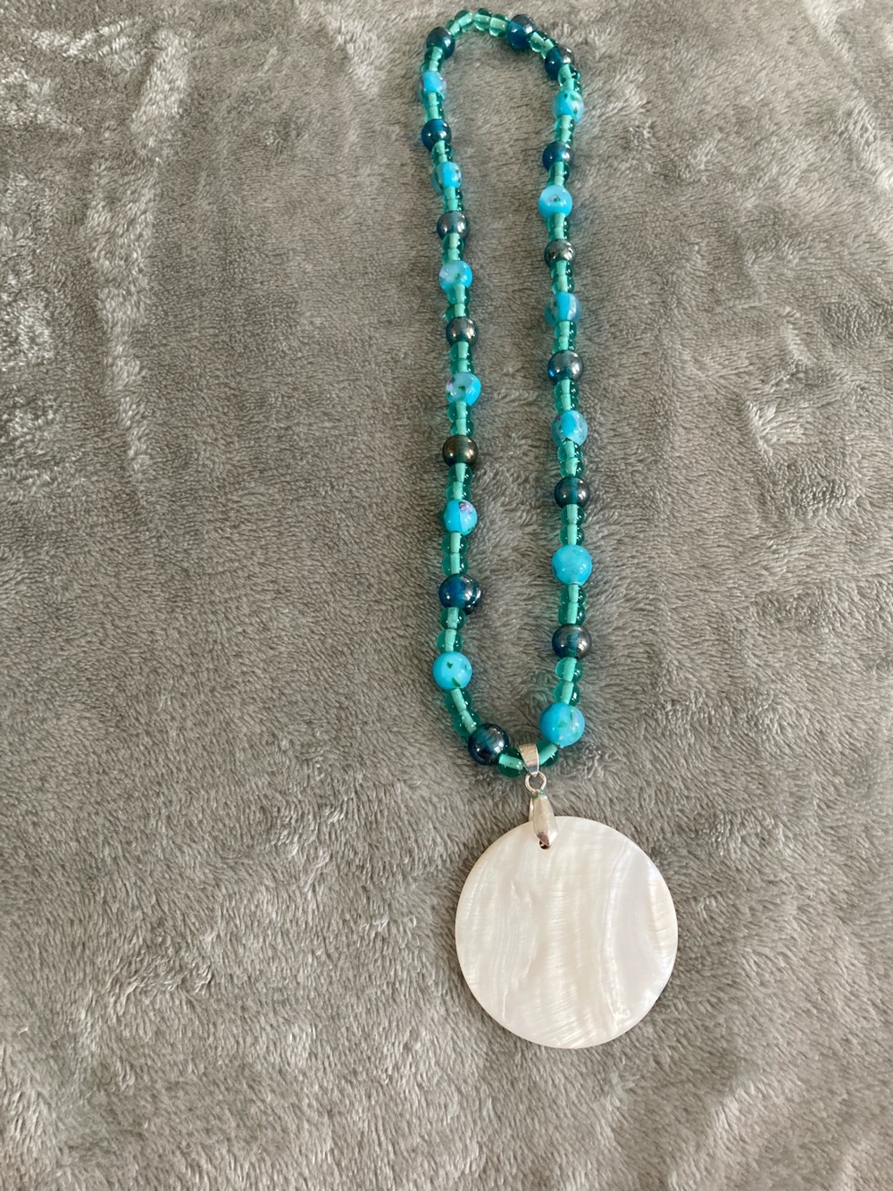 Ocean blue shell pendant necklace
